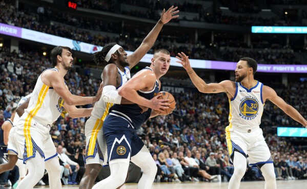 Exhausted Jokic scores 35 points Nuggets hold off Curry Warriors
